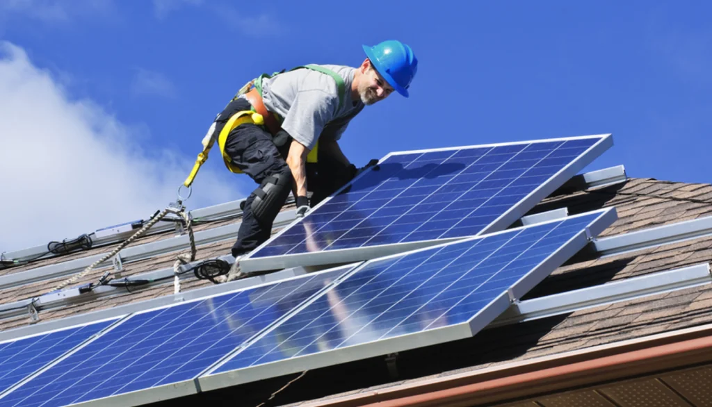 Solar panels being installed on a roof